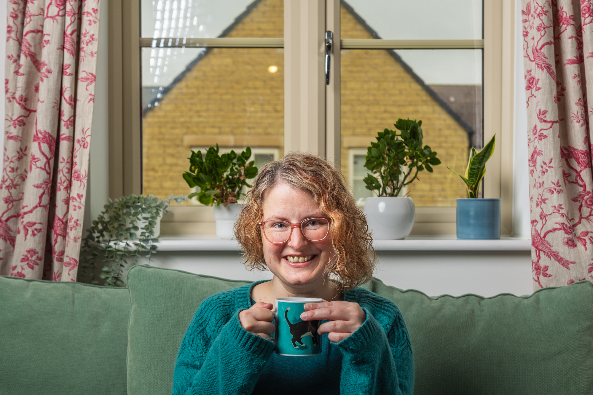 customer on sofa smiling
