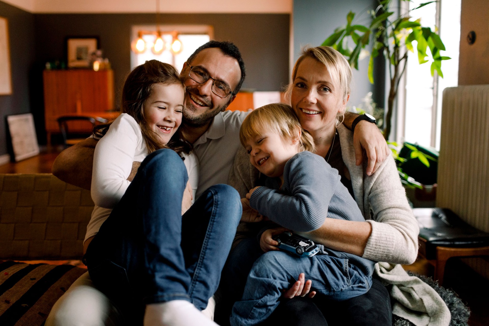 Sparrow customer family on sofa